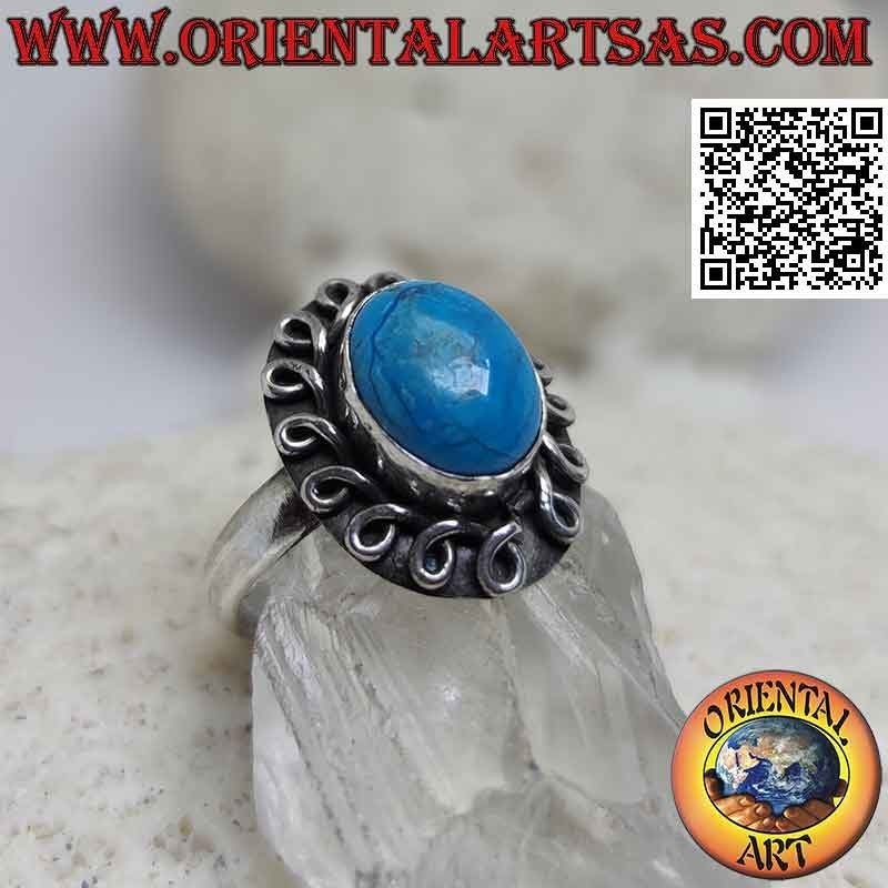 Silver ring with cabochon oval turquoise surrounded by a rolled line