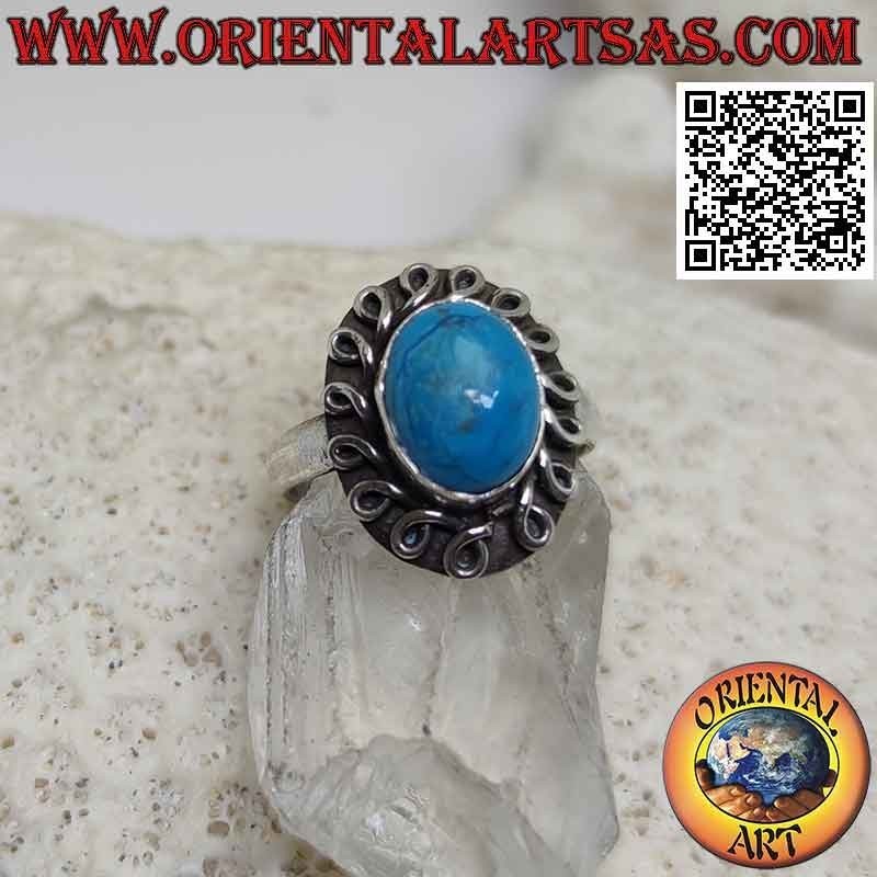Bague en argent avec cabochon ovale turquoise entouré d'un trait roulé