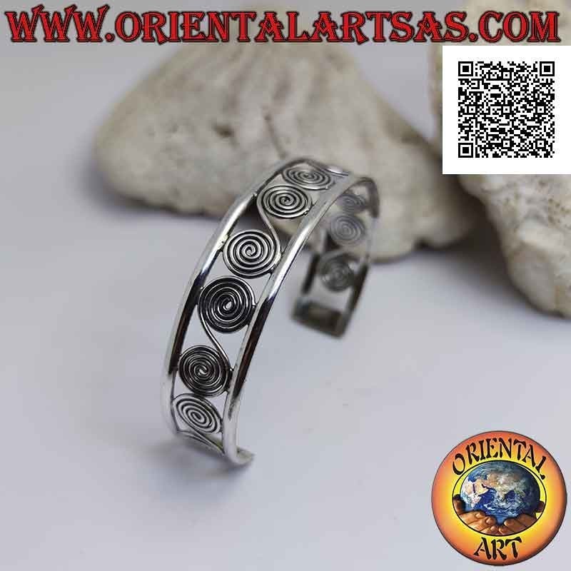 Bracelet rigide en argent 925 ‰ ajouré, une succession de spirales grecques entre deux lignes douces
