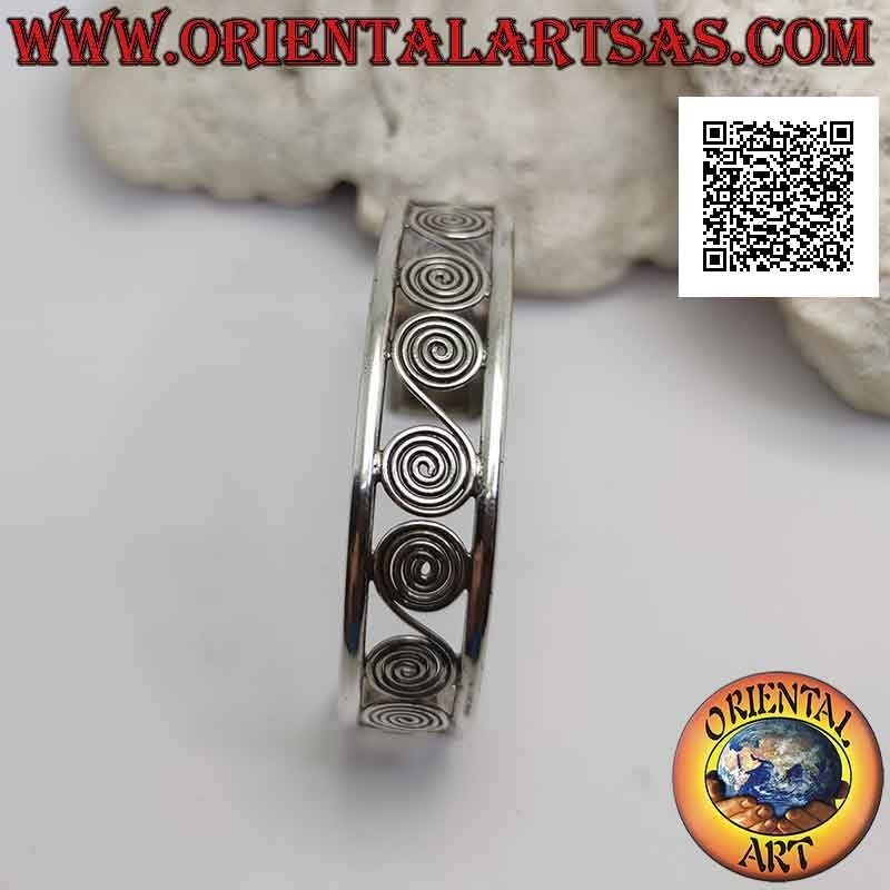 Bracelet rigide en argent 925 ‰ ajouré, une succession de spirales grecques entre deux lignes douces