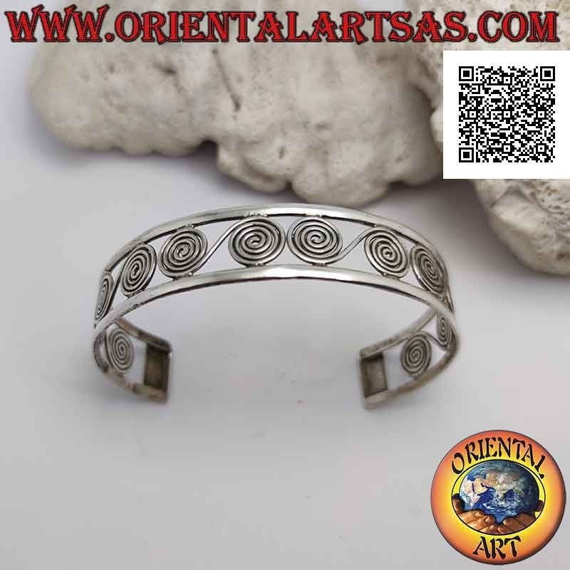 Bracelet rigide en argent 925 ‰ ajouré, une succession de spirales grecques entre deux lignes douces