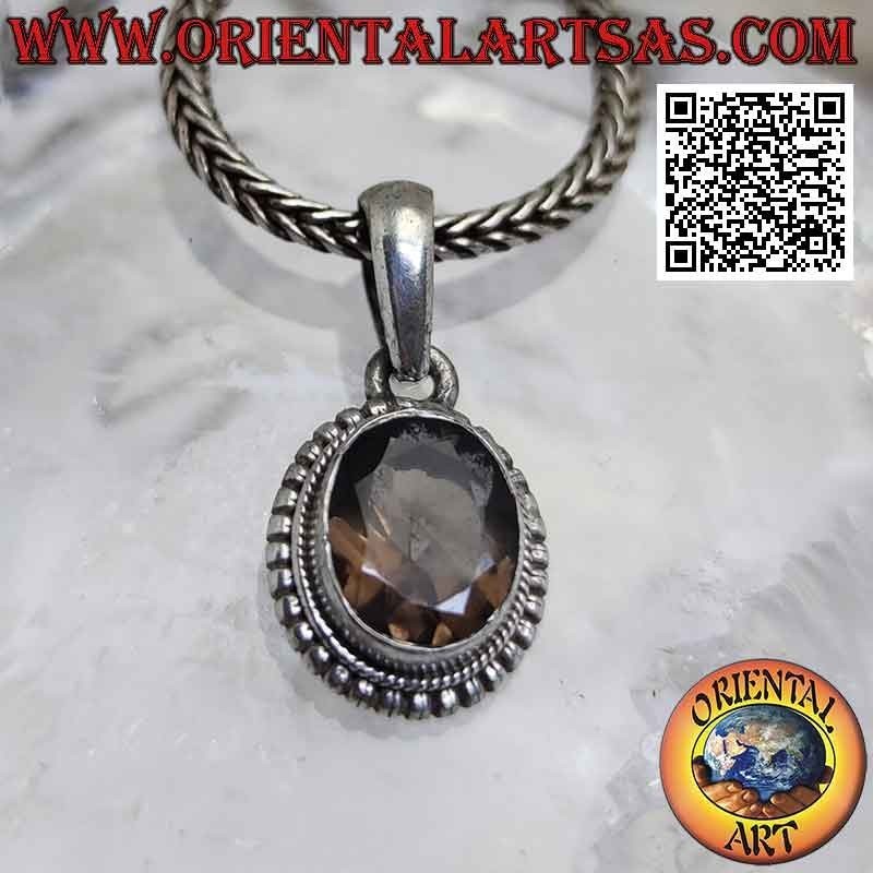 Silver pendant with oval smoky topaz surrounded by weaving