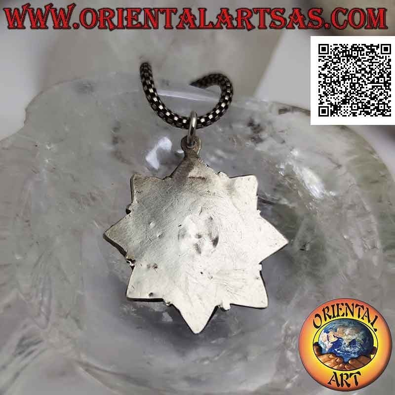 Ciondolo in argento, stella a otto punte con turchesi e coralli antichi tibetani e decorazione a filigrana