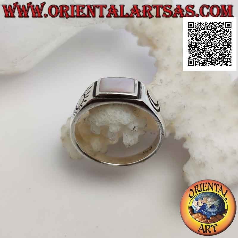 Smooth silver ring with rectangular mother of pearl and sun and moon engraved on the sides