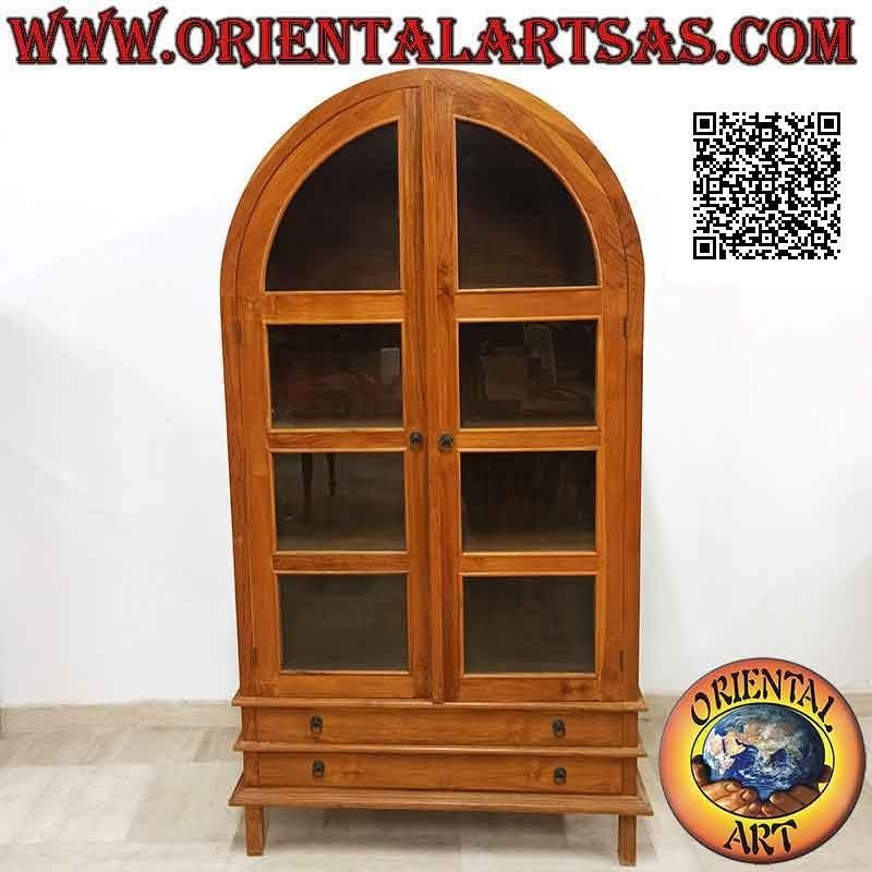 Vitrine haute galbée à double porte (quatre étagères et deux tiroirs) en bois de teck