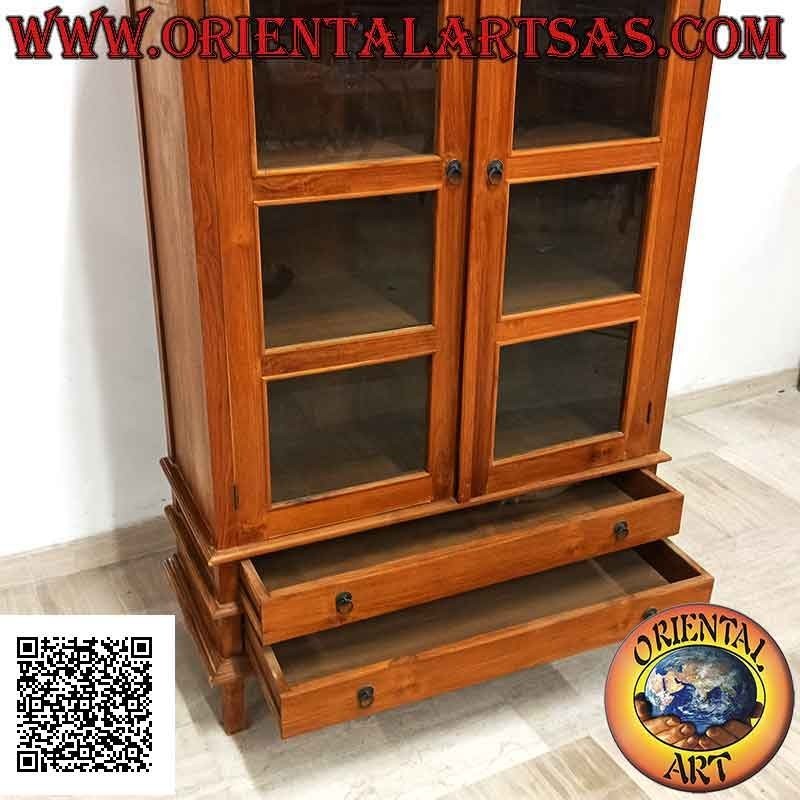 Vitrine haute galbée à double porte (quatre étagères et deux tiroirs) en bois de teck
