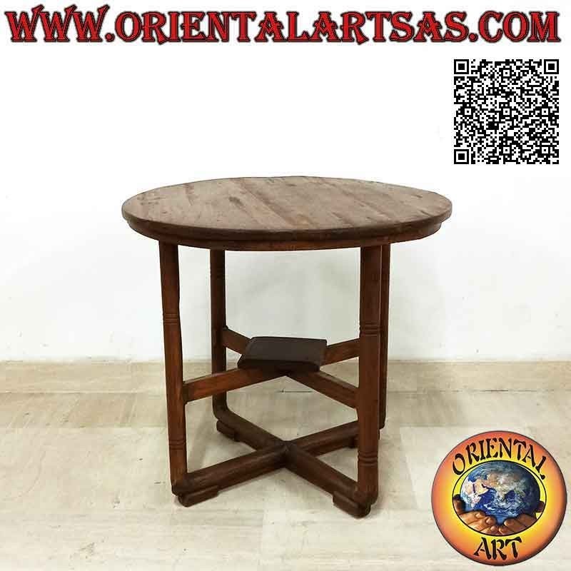 Table ronde à quatre pieds croisés au centre sur deux niveaux en bois de teck antique (65 cm Ø)
