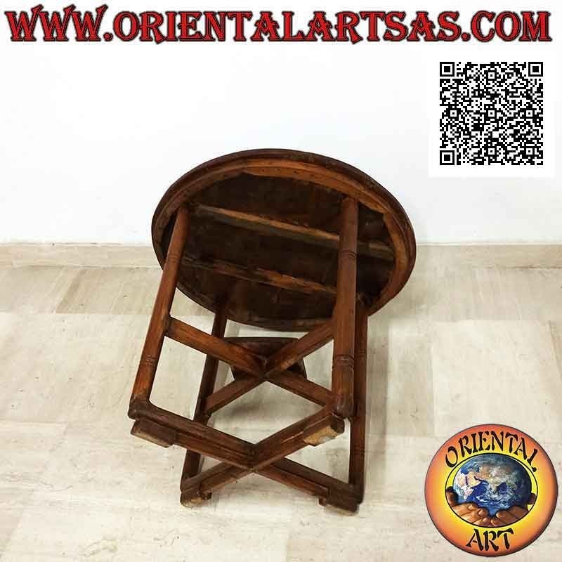 Mesa redonda con cuatro patas cruzadas en el centro en dos niveles en madera de teca antigua (65 cm Ø)