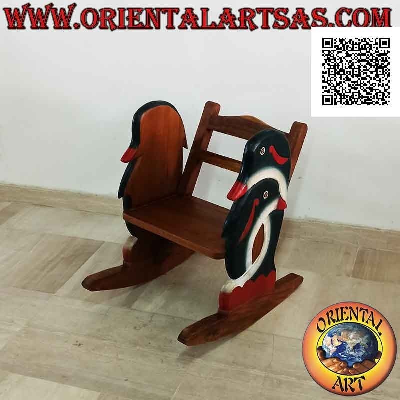 Banco mecedora para niños en madera de Suar (maciza) con delfines pintados en los laterales