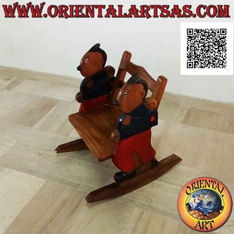 Banco mecedora para niños en madera de Suar (maciza) con estudiante (azul) pintado en los laterales