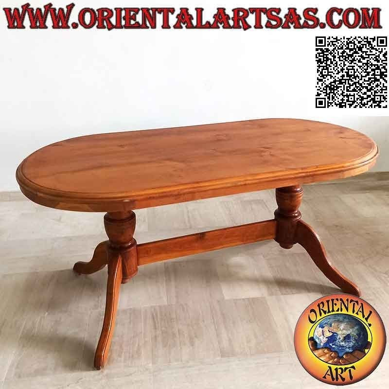 Table ovale sur deux pieds de style impérial à trois pieds réunis en bois de teck antique (90 x 180 cm)