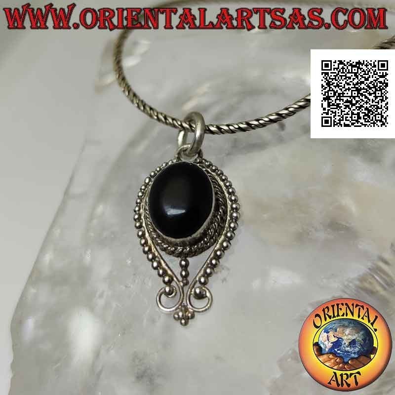 Silver pendant with oval onyx surrounded by an inverted drop of balls