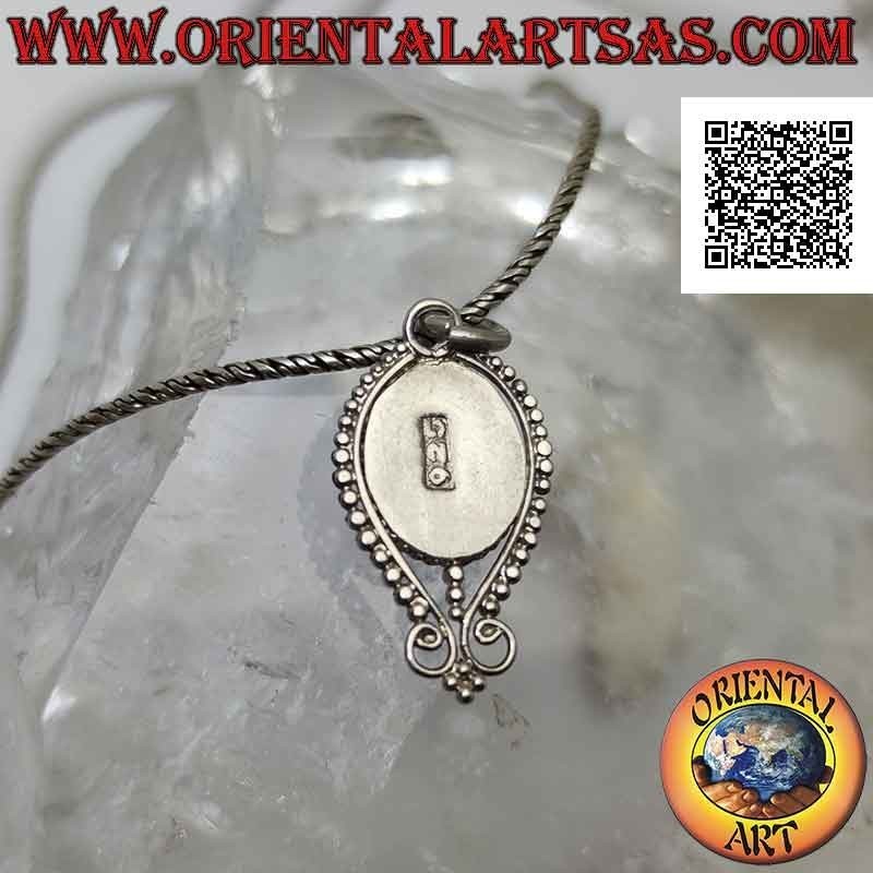 Silver pendant with oval onyx surrounded by an inverted drop of balls