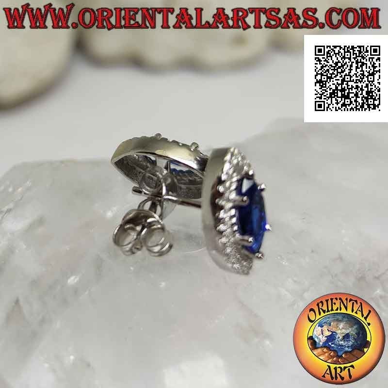 Silver earrings with synthetic shuttle sapphire set surrounded by white zircons