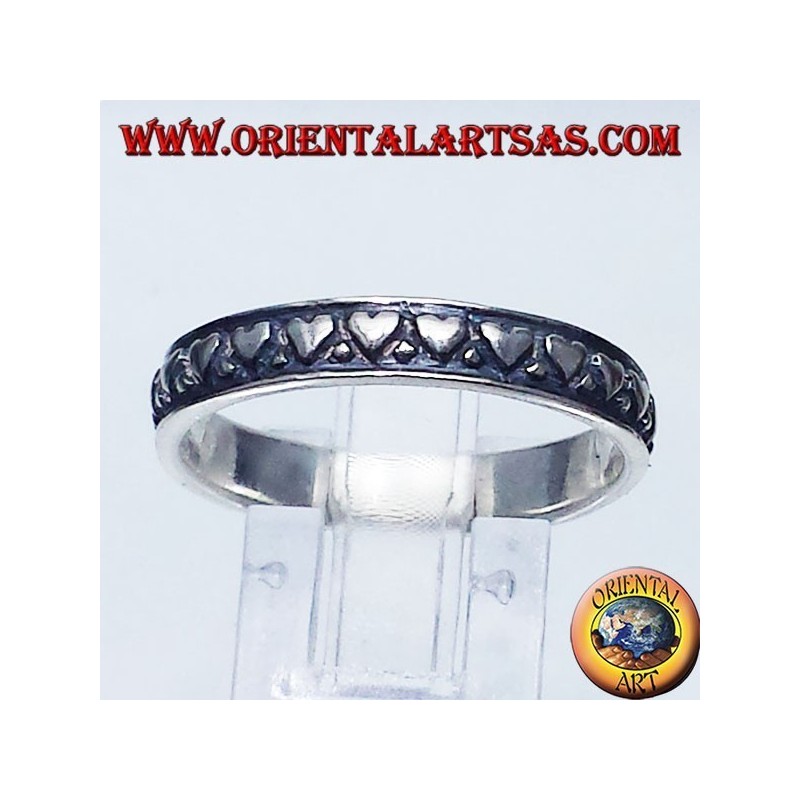 anello in argento, fedina  con cuori intagliati 