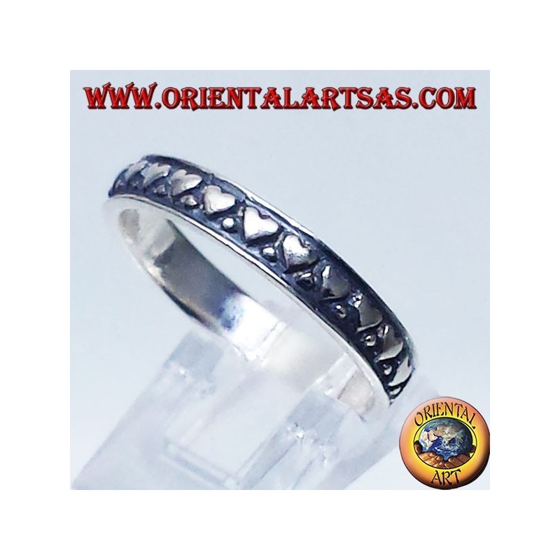anillo de plata, anillo de boda con corazones tallados