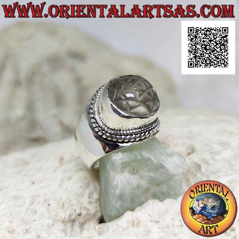 Silver ring with Sri Yantra mandala engraved on round rock crystal