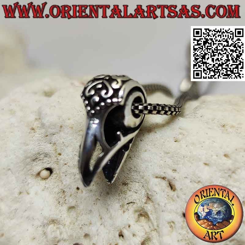 Pendentif en argent, bec de rapace (décoré et percé)