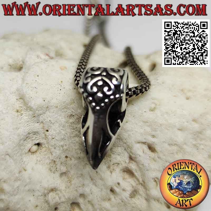 Pendentif en argent, bec de rapace (décoré et percé)