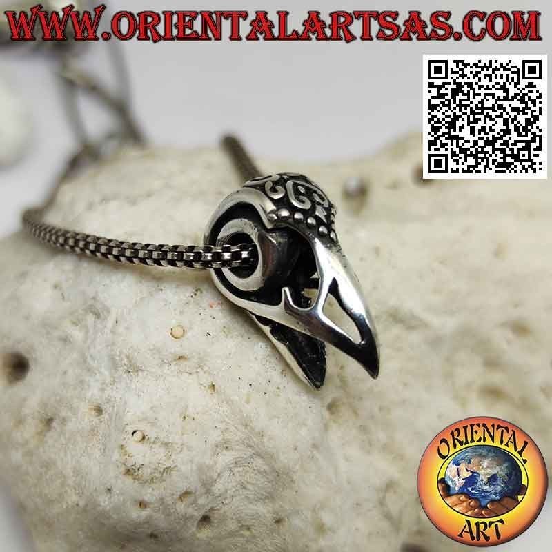 Pendentif en argent, bec de rapace (décoré et percé)