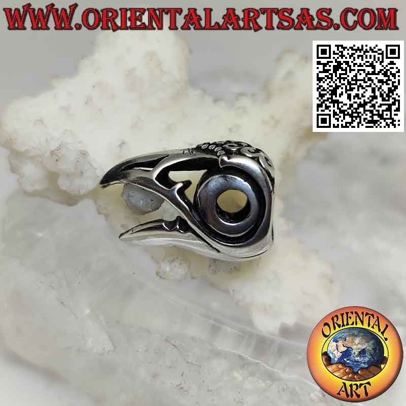 Pendentif en argent, bec de rapace (décoré et percé)