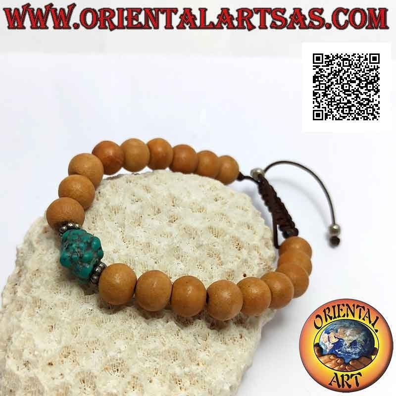 Mālā wrist bracelet in 8 mm beads. sandalwood and central turquoise (adjustable)