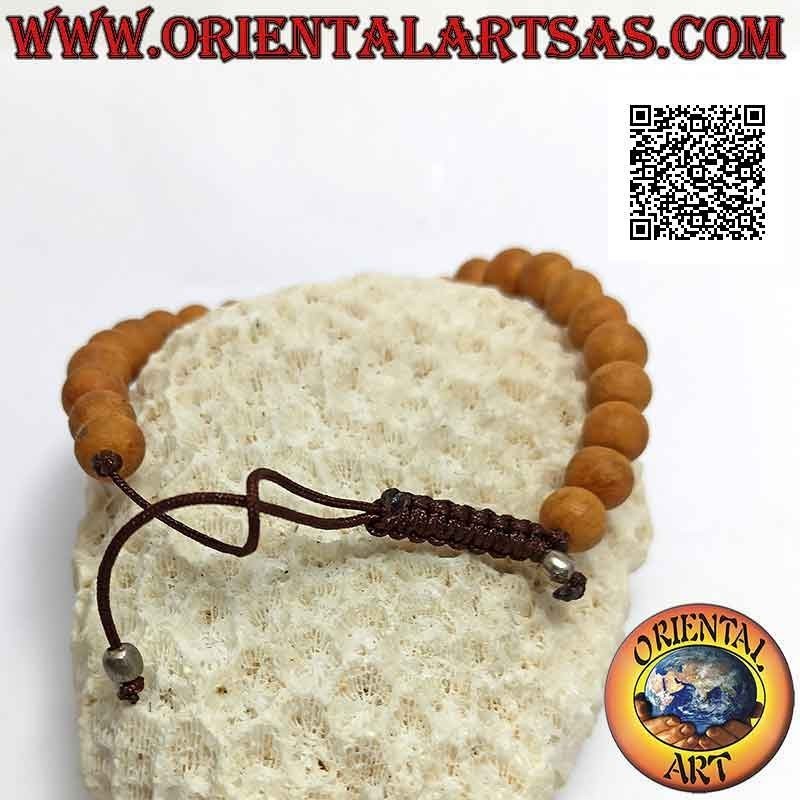 Mālā Armband aus 8 mm Perlen. Sandelholz und zentrales Türkis (verstellbar)