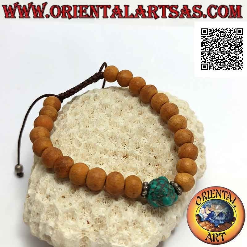 Mālā wrist bracelet in 8 mm beads. sandalwood and central turquoise (adjustable)