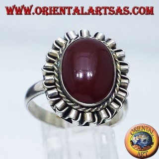 Silver ring with carnelian oval cabochon