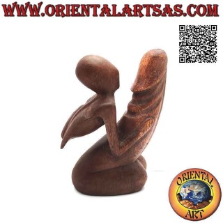 Erotic sculpture "the man embraced the penis" in abstract style in suar wood, 15 cm