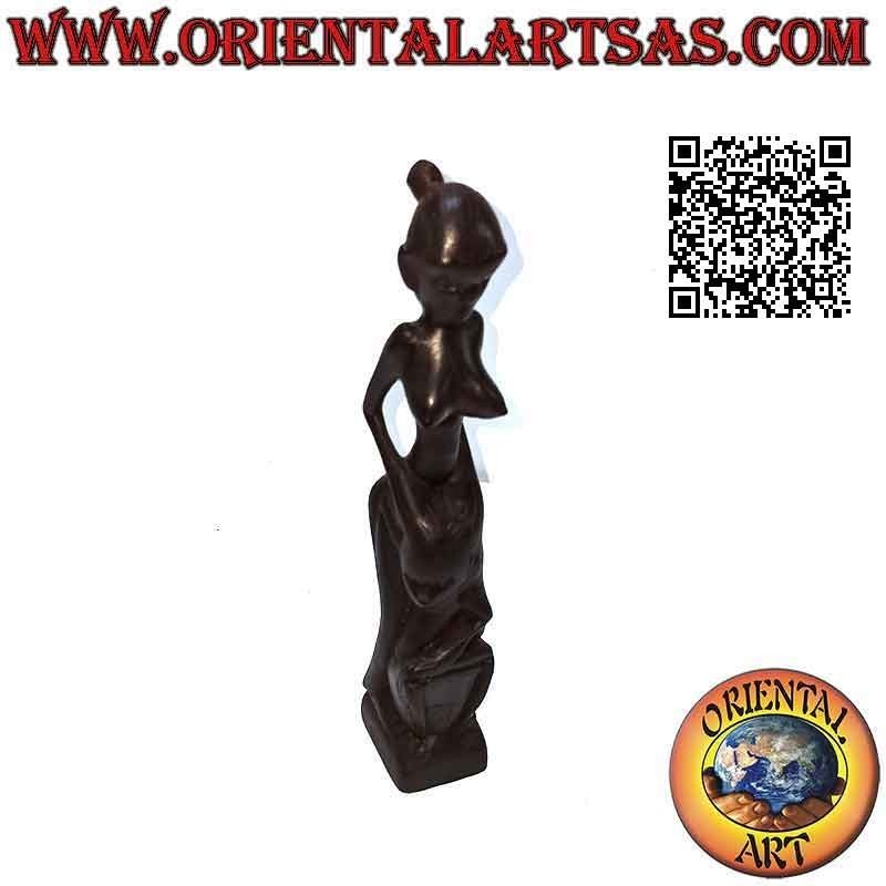 Sculpture of an indigenous mother and son in ebony wood