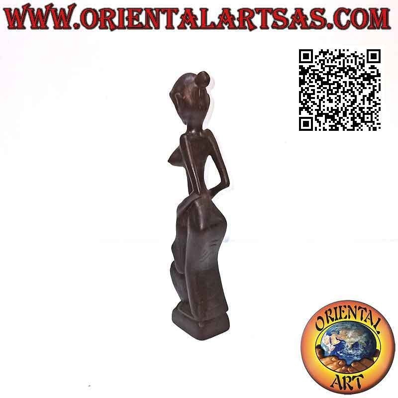 Sculpture of an indigenous mother and son in ebony wood