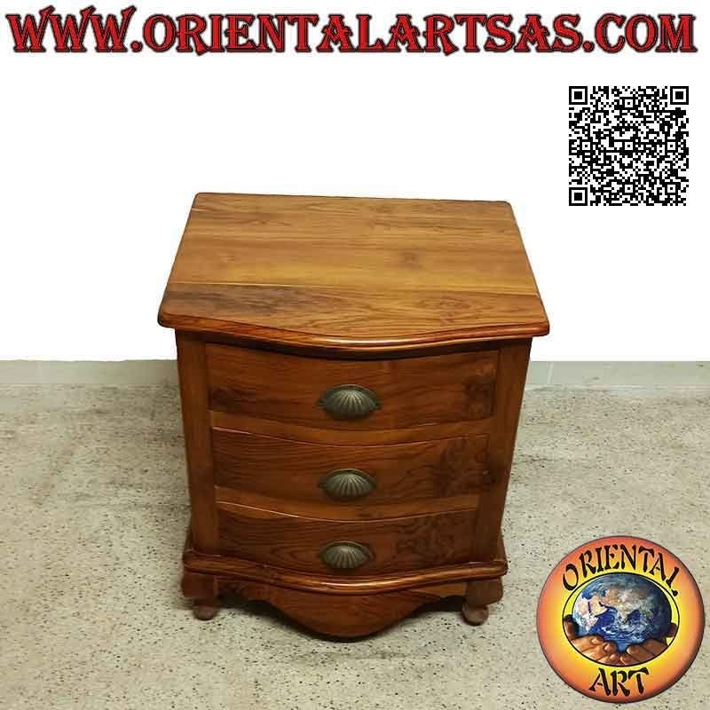 Rounded bedside table with three drawers with curved feet and brass handles in teak wood