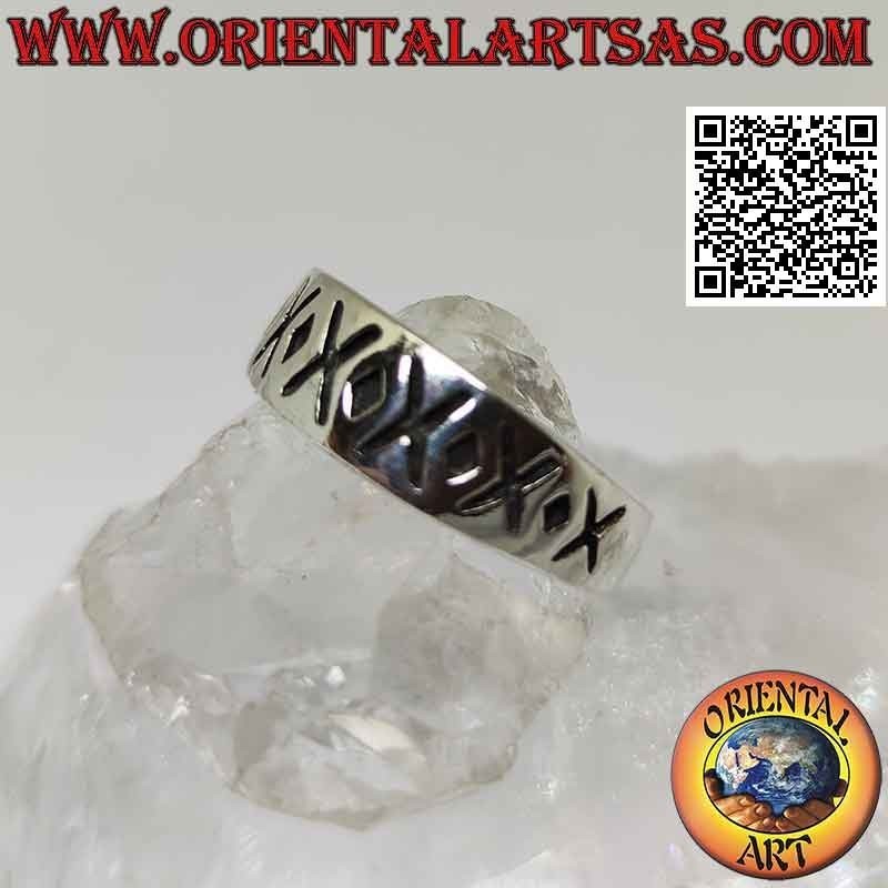 Silver ring with crescent band with alternating engraved X and dot