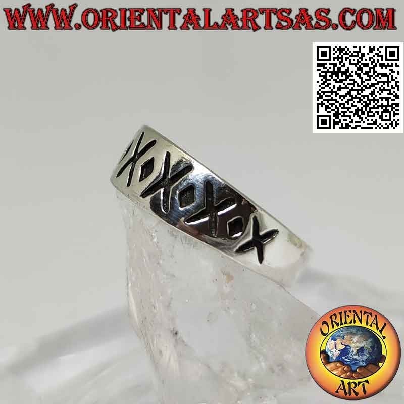 Silver ring with crescent band with alternating engraved X and dot