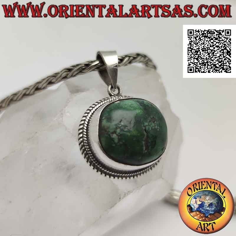 Ciondolo in argento con turchese antico tibetano naturale ovale irregolare contornato da doppio intreccio