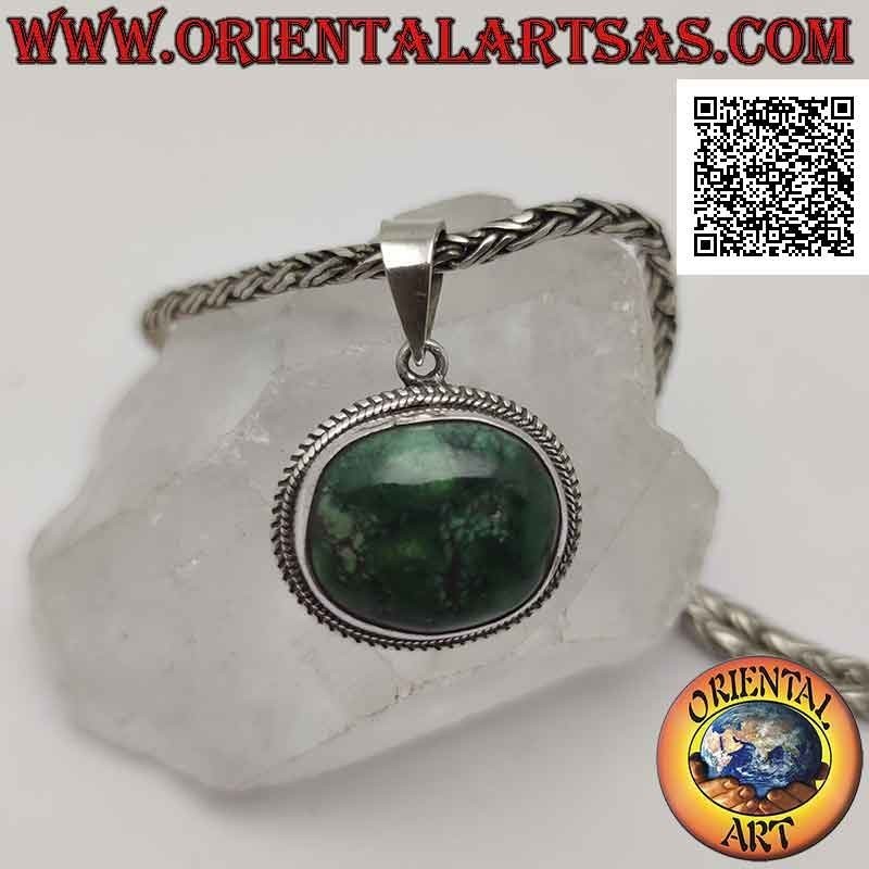 Colgante de plata con turquesa antigua tibetana irregular ovalada natural rodeada por un tejido doble