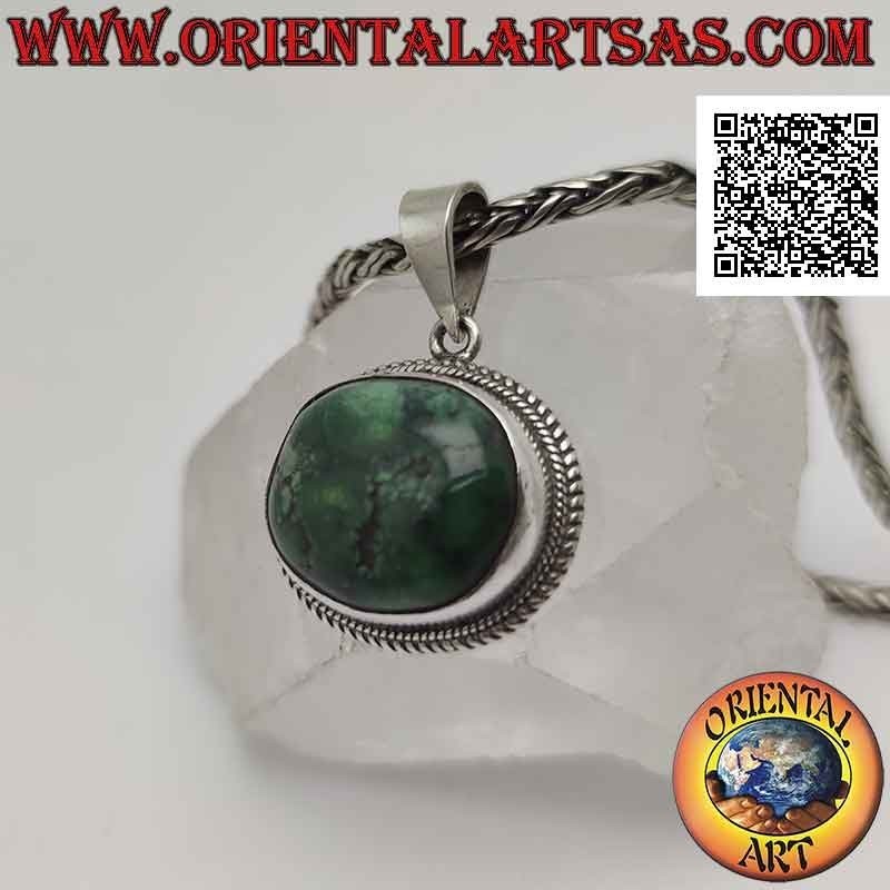 Colgante de plata con turquesa antigua tibetana irregular ovalada natural rodeada por un tejido doble