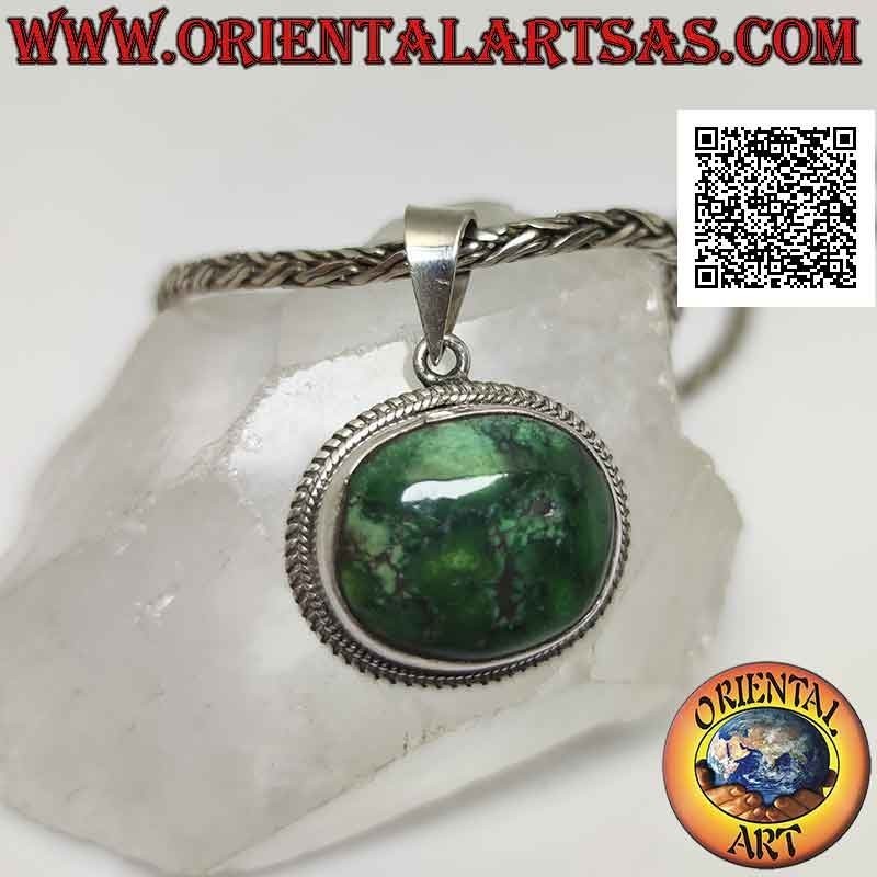 Pendentif en argent avec turquoise antique tibétaine ovale irrégulière naturelle entourée d'un double tissage