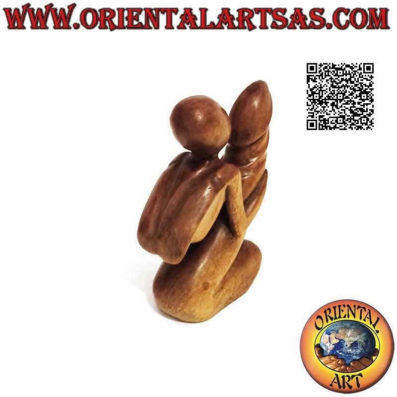 Scultura erotica "l'uomo abbracciato al pene" in stile abstract in legno di suar, 17 cm