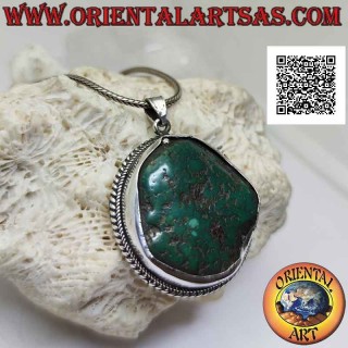 Ciondolo in argento antico con turchese tibetano naturale irregolare contornato da intreccio