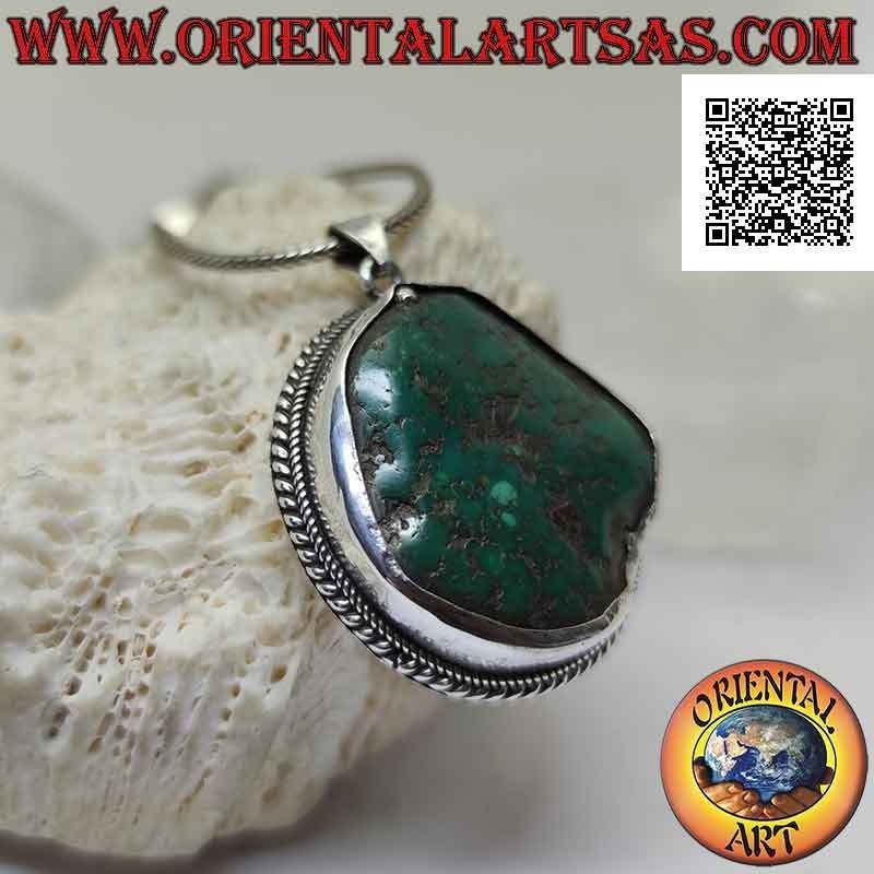 Ciondolo in argento antico con turchese tibetano naturale irregolare contornato da intreccio