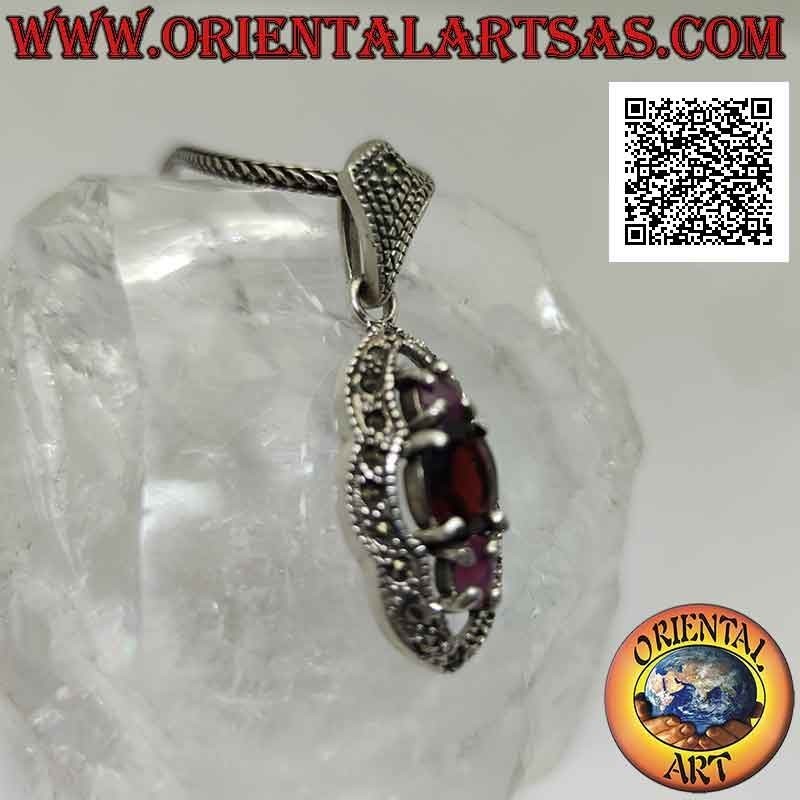 Silver pendant, garnet between natural oval rubies set with a marcasite frame