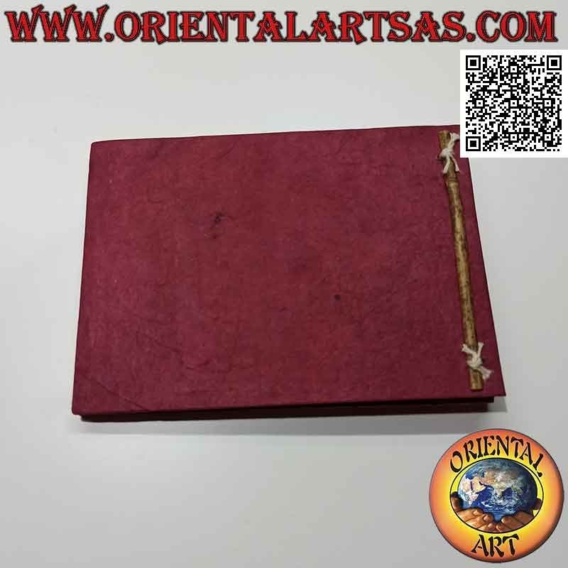 Photo album in Nepalese rice paper and black leaf sheets, (14 x 19 cm)