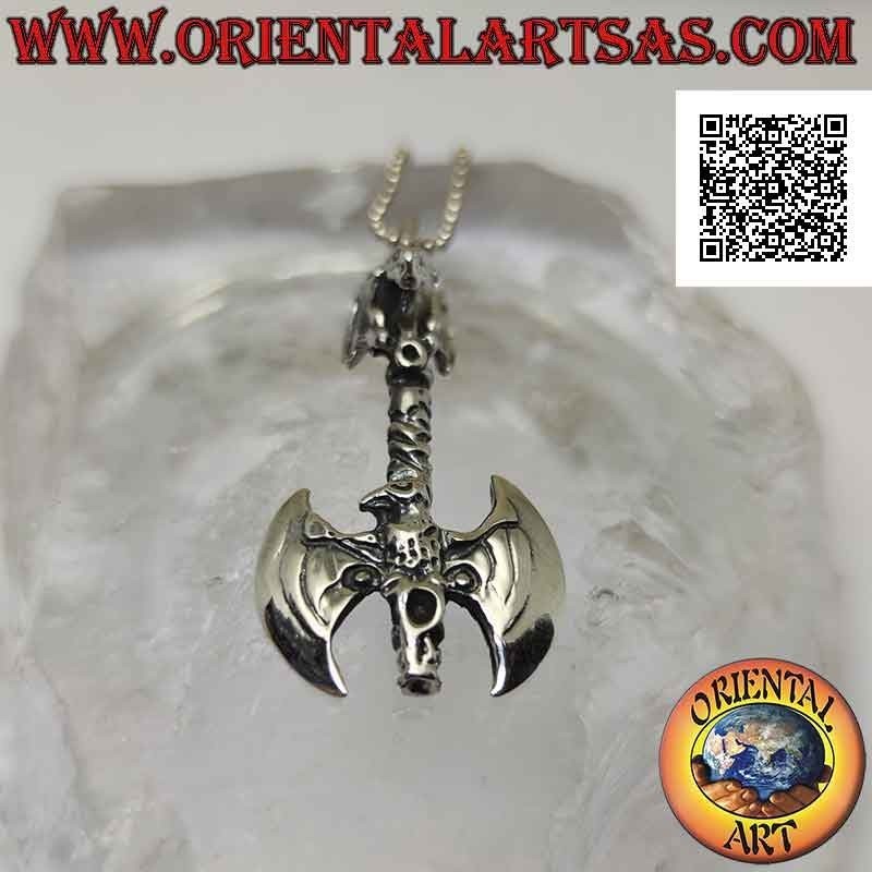 Silver pendant, double ax surmounted by a dragon on the handle and with embossed eagle on the blades