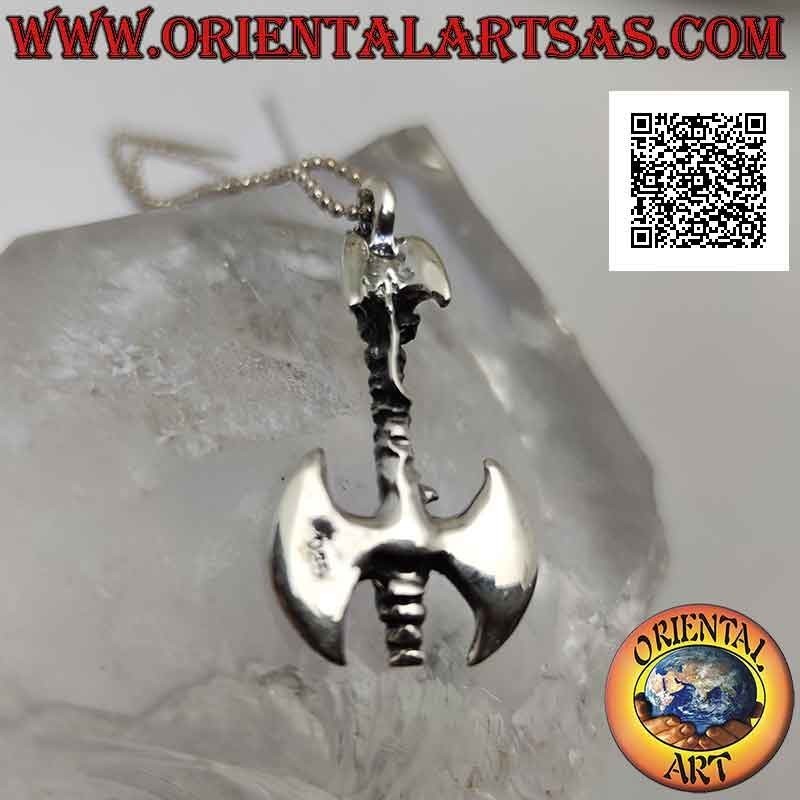 Silver pendant, double ax surmounted by a dragon on the handle and with embossed eagle on the blades