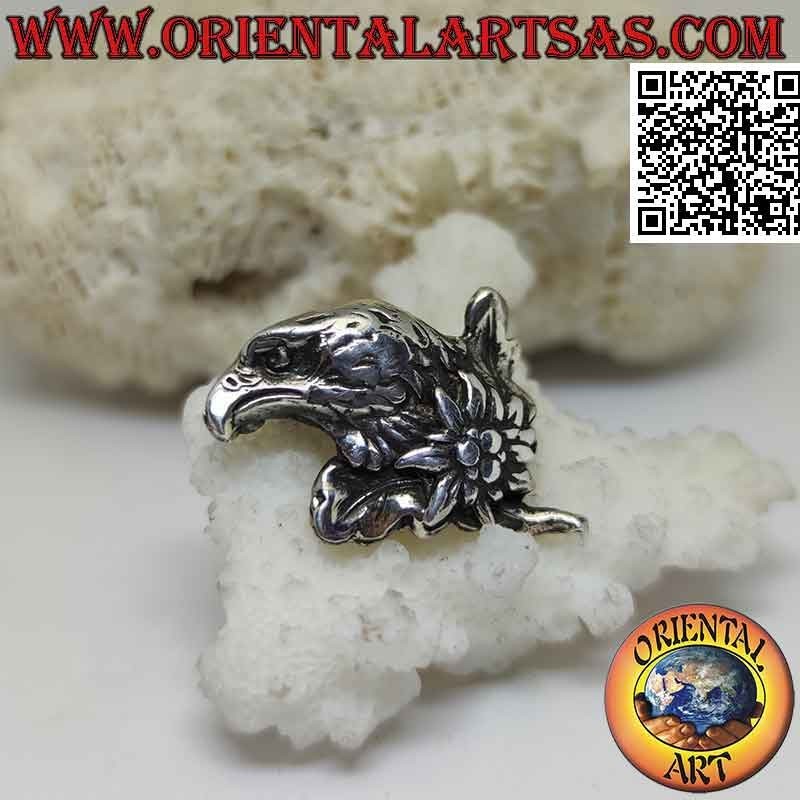 Broche en argent, visage d'aigle de profil avec fleur sur le cou