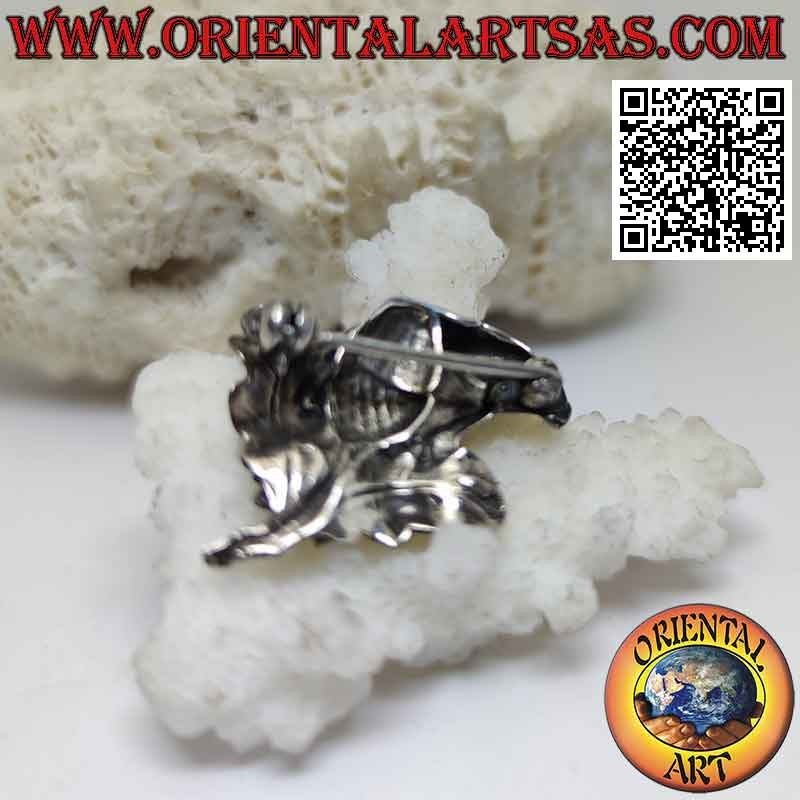 Silver brooch, eagle face in profile with flower on the neck
