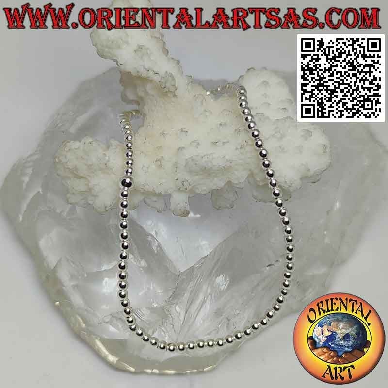 Pulsera de plata con bolas de 2 mm Ø ensartadas en elástico