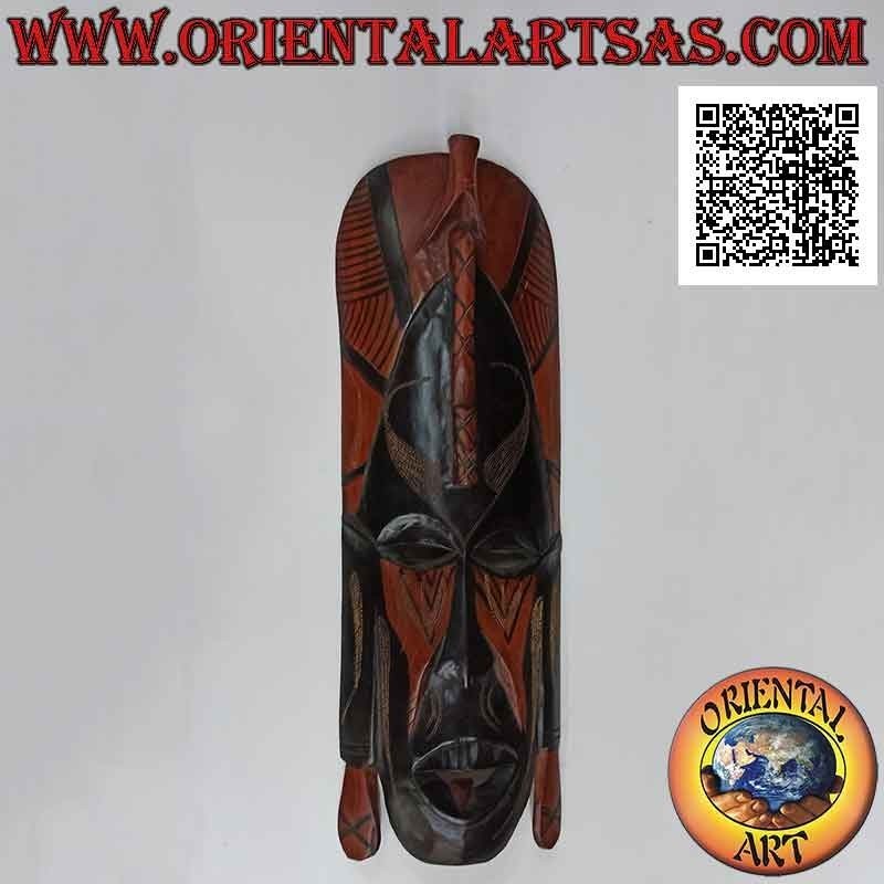 Máscara tallada y pintada a mano de un nativo africano en madera de ébano, 65 x 20 cm